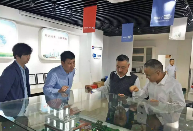 河南省驻沪办走访上海开来湿克威